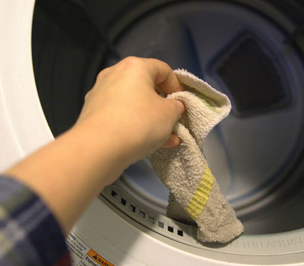 putting dryer sheet in the dryer