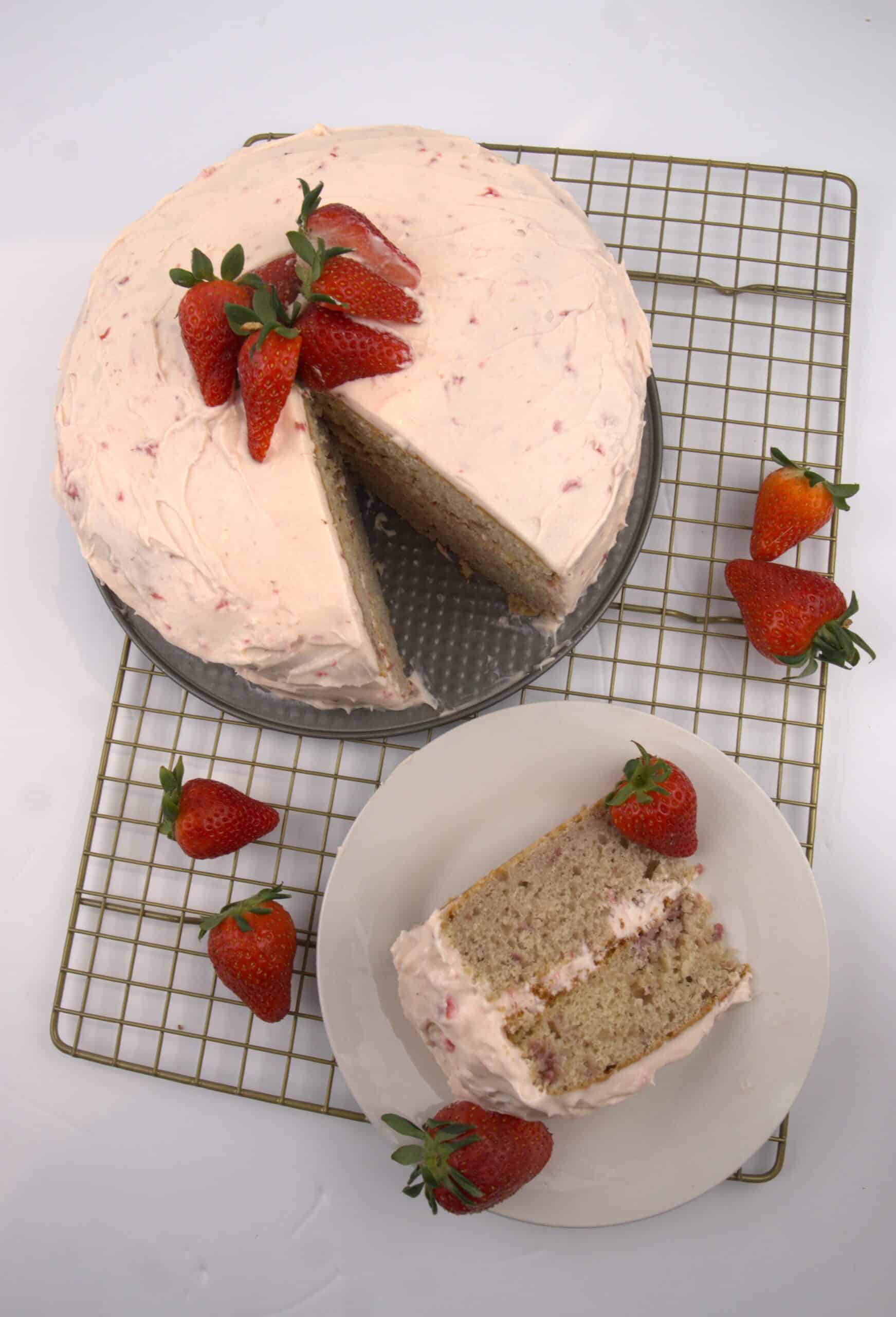 strawberry cake with slice removed